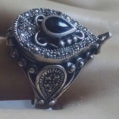 Women's True Vintage Rare Beautifully Uniquely Designed Gorgeous Collectible Poison Black Onyx & Marcasite Gemstone Hidden Compartment Sterling Silver Ring Size 6.75. It Is Made Of Sterling Silver Stamped 925. This Ring Has A Pear-Shaped Top Along With A Very Ornate Design With Marcasite Stones All Around And A Pear-Shaped Black Onyx Stone In The Middle. It Is A Must Have. Looks Way Better Than Pictures Shows. It Is Heavy And Well Made. Very Hard To Find, Will Make A Great Gift. Thank You For Looking, Have A Great Day. Ornate Design, Black Onyx Stone, Onyx Stone, True Vintage, Womens Jewelry Rings, Gemstone Ring, Have A Great Day, Black Onyx, Pear Shaped