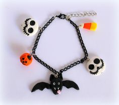 a bracelet with halloween decorations on it