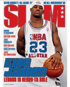 a man holding a basketball on the cover of slam magazine