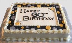 a birthday cake with white frosting and black and gold decorations on it that says happy 60th