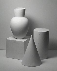 black and white photograph of three different shapes