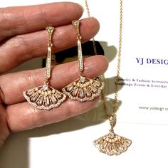 "A bohemian Art Deco Gatsby wedding style cz bridal jewelry set, featuring geometric fan shape boho bridal earrings on sterling silver posts and necklace made of clear cubic zirconia in your choice of white, yellow and rose gold plating. Earrings are about 1 3/4\" (4.3cm) with posts. Pendant is 7/8\" (2.3cm) long with bail. Chain length can be added with a 2\" extender chain. View matching pieces or similar designs at https://etsy.me/2UncS3p See all geometric designs at https://etsy.me/2eKf6s8 V Boho Bridal Earrings, Princess Cut Diamond Earrings, Boho Bridal Jewelry, Boho Wedding Jewelry, Art Nouveau Earring, Crystal Earrings Wedding, Bridal Jewelry Set, Gatsby Wedding, Swarovski Crystal Jewelry