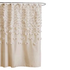 a shower curtain with white flowers on it in a gray and light blue color scheme