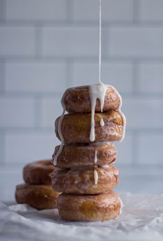 a stack of doughnuts with icing on them