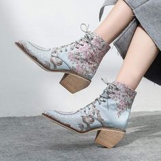 This is a special and unique boot, right? It certainly adds score to your whole styling. Featuring gorgeous floral embroidery and a classy wooden heel, it's certainly a pair of boots that will turn some heads. Specs: Material: Microfiber, Rubber Floral Embroidered Heels, Boots Wedding, Pretty Boots, Embroidered Heels, Unique Boots, Short Ankle Boots, Embroidered Boots, High Heel Boots Ankle, Wooden Heel