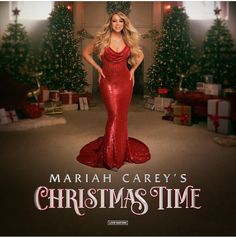 the poster for mariah carey's christmas time shows a woman in a red gown