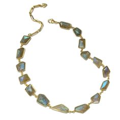 A luminous rivière style necklace features a full line of freeform bezel set blue-green iridescent labradorite gemstones. The domed flat back stones are faceted on both sides, for maximum shimmer and glow. Finished with a lobster claw clasp and premium heavyweight chain extender, you can wear with the chain drop facing forward at the 16"- 17" length for a twist on the classics. This is a limited edition item. Each necklace has unique, but similar stones, all hand selected for quality. It is said Chain Extenders, Natural Energy, Jewelry Cleaner, Style Necklace, Bezel Setting, Lobster Claw, Jewelry Care, Labradorite, Sale Items