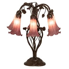 a table lamp with three pink flowers on it's base and one light in the middle