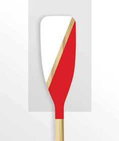 a red and white spatula with a wooden handle on a white background for text