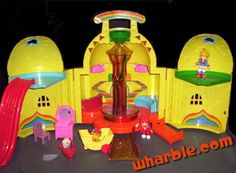 an inflatable water park with slides and toys