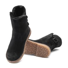 Introducing the brand new BIRKENSTOCK Upsalla. The perfect cozy, mid-high boot with a warm genuine shearling lining. The upper is made from especially soft suede. The sole is made of TR rubber for added grip and durability. These versatile boots will help you stay stylish and supported, even on chilly days. Removable, anatomically shaped cork-latex footbed Upper: suede Footbed lining: smooth leather Sole: TR rubber Made in Portugal Mid High Boots, Black Birkenstock, Mid Boots, Shearling Boots, Black Boots Women, Dansko Professional Clog, Soft Suede, Perfect Pair, Smooth Leather