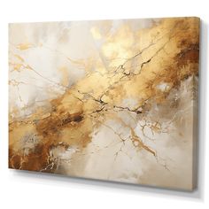 an abstract painting with gold and white colors on the canvas, it looks like marble