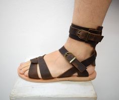 Roman Armor leather sandals, Men sandals with High Quality Genuine Leather and Free express shipping FREE SHIPPING VIA DHL / FEDEX / TNT EXPRESS WORLDWIDE (Please include a phone number at checkout, as it's required by the carrier). Handmade sandals, 100% High Quality Genuine Leather. Classic and stylish, handmade unisex sandals in a vast variety of colors, will complement your outfit for casual appeal.It characterize them the natural leather insole, leather outer sole and leather upper, making Leather Sandals Men, Roman Armor, Mens Shoes Sandals, Men Sandals, Roman Sandals, Mens Leather Sandals, Handmade Sandals, Sport Sandals, Mens Sandals