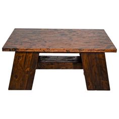 an old wooden table with no legs on it, against a white background or backdrop