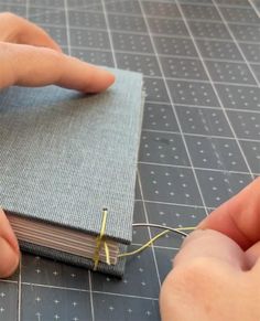 someone is making a book out of fabric