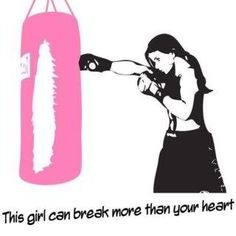 a woman hitting a pink punching bag with the words, this girl can break more than your heart