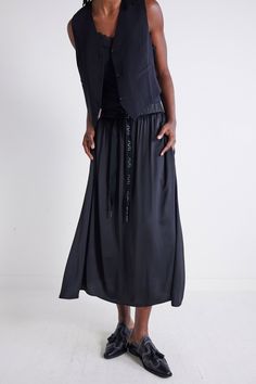 A timeless piece that features a maxi length and delicate pleats that add elegance and versatility to any wardrobe. Perfect for both casual and formal occasions, it effortlessly transitions from day to night with ease. Elasticized waist with Ruti tie detail Pleated design Maxi length Day To Night, To Night, Formal Occasion, Timeless Pieces, Maxi Skirt, Latest Fashion, Fashion Forward, Skirt, Wardrobe