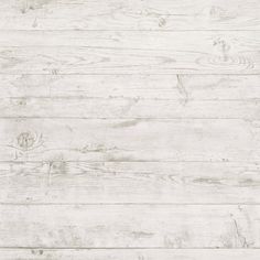 an old white wooden wall with knots and nails on the wood grained surface, as a background or texture