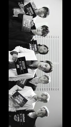 four women are standing in a row with their books on their shoulders and one woman is wearing a white shirt