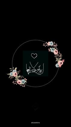 two hands holding each other with flowers in the middle and a heart above them on a black background