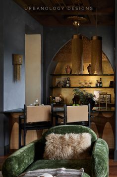 a living room filled with furniture and a fire place