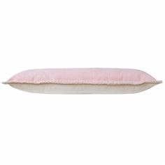 a pink and white pillow on a white background