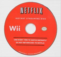 a red disc with the words netflix on it that says,'i use every time to watch instantity do not return disc to netflix