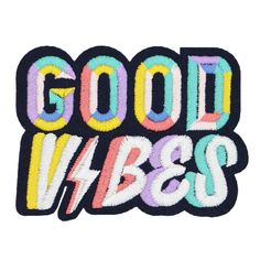 an embroidered patch with the words good vibes in multicolored letters on it