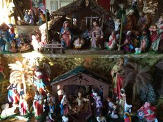 a nativity scene with figurines on display