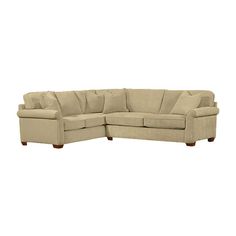 a large sectional couch sitting on top of a white floor