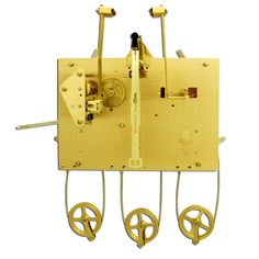 a yellow clock with four wheels attached to it