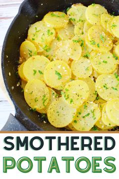 a skillet filled with potatoes on top of a wooden table next to the words, smothered potatoes