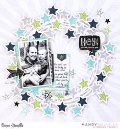 a scrapbook page with an image of two people holding each other and stars around them