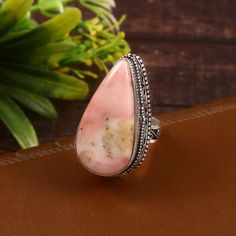 Natural pink opal ring gemstone ring 925 starling silver  ring gift for her anniversary gift Stone. pink opal  Weight.  15 gm * Benefits Of Wearing Silver As a metal, silver has significant health benefits that have been used across cultures for centuries. Silver has a proven track record as a powerful antimicrobial agent fighting infections and aiding in cold and flu prevention, wound healing, and more. Silver also helps with internal heat regulation and circulation. * you can't find the information you need or need some advice for your design? Feel free to contact us. We are fast to reply :) * All our work is made by hand with Love and Care in our workshop ♡ Thank you for visit my shop Pink Sterling Silver Opal Ring For Anniversary, Pink Opal Ring In Sterling Silver For Anniversary, Pink Opal Sterling Silver Ring Gift, Pink Opal Ring In Sterling Silver For Gift, Pink Opal Gemstone Rings, Pink Opal Rings With Gemstone, Silver Pink Opal Ring Gift, Silver Pink Opal Ring For Gift, Pink Opal Rings As A Gift