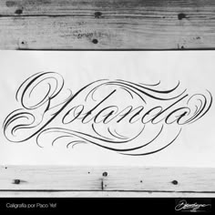 a piece of paper that has some type of lettering on it with the word roma written in cursive writing