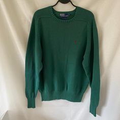 Men's size medium  The perfect vintage pullover.  Amazing green color, vintage condition (still in great condition for a vintage piece), long sleeve, 100% cotton material, crew neck style. Green Crew Sweater With Ribbed Cuffs, Classic Green Sweater With Ribbed Cuffs, Green Crew Neck Sweater With Ribbed Collar, Green Crew Neck Sweater With Ribbed Cuffs, Green Crew Neck Polo Sweater, Green Long Sleeve Polo Sweater With Ribbed Cuffs, Green Crew Neck Sweater, Classic Green Sweater With Ribbed Collar, Casual Green Polo Sweater For Fall