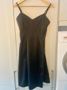 Absolutely stunning vintage y2k Coast black satin slip mini dress. Spaghetti straps, angular sweetheart neckline and a slight fit and flare design. There is boning in the bodice for support and structure. Lined. Perfect little black dress for parties, occasions or evenings out.  In great condition no noticeable stains or defects  Smoke and pet free home 🏡  #lbd #black #dress #cocktail #short #knee #fitted #satin #stretch #boning #boned #corset #vintage #y2k #party #christmas #new #year #years # Emo Halloween, Black Dress Cocktail, Black Satin Mini Dress, Dress For Parties, Gothic Emo, Y2k Party, Perfect Little Black Dress, Dress Cocktail, Dress Spaghetti