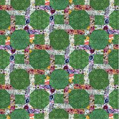 an abstract pattern with many different colors and shapes on the green grass, as well as flowers