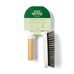 a green and white brush with the words ever spring on it