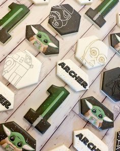 star wars themed cookies are arranged on a table