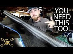 a man is holding up a large piece of metal in front of him and the words, you need this tool