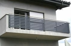 a man riding a skateboard on the side of a building