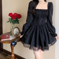 Dark Lolita Gothic Princess Dress with lace ruffles, stretchy back, laced-up front and long puff sleeves. 📝 Please note, the dress does not come with a petticoat (for the dress to have a puffy skirt volume as in the photos, you would need to add a petticoat underneath it). Plus sizes included. Size MBust: 80-88cm (stretchy) Waist: stretchy (60cm-72cm)Length: 82cm Size LBust: 80-92cm Waist: stretchy (64cm - 76cm)Length: 83cm Size XLBust: 84-96cm Waist: stretchy (68cm - 80cm)Length: 84cm Size XXL Gothic Square Neck Party Dress, Long Sleeve Ruffled Corset Dress For Summer, Long Sleeve Ruffled Balletcore Dress, Summer Long Sleeve Corset Dress, Long Sleeve Balletcore Dress For Summer, Long Sleeve Corset Dress For Parties, Long Sleeve Corset Back Dress For Party, Gothic Long Sleeve Mini Dress With Ruffles, Balletcore Dress With Square Neck For Party