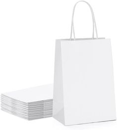 white paper bags stacked on top of each other