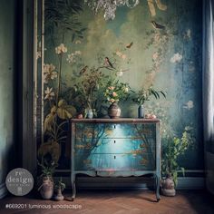 an ornate dresser with flowers and birds painted on the wall next to a chandelier