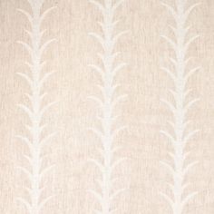 a beige and white wallpaper with leaves on it