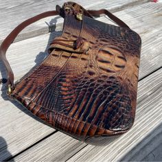 Brahmin Isabelle Pecan Brown Handbag Looks Like New With A Crocodile Embossed Leather. The Interior And Exterior Looks Great With No Rips Or Tears Or Stains. Pls See Photos As These Are Part Of The Description. Vintage Bag Purse - Pecan Brown - 3 Pockets Inside -1 Out Side Pocket -Adjustable Strap To A Hand Bag/Shoulder To Crossbody Bag Up To 41” -Size : 8 X 12 X 3.5” Approx. Condition: Excellent Pre-Owned Condition. Smoke And Pet Free Clean Environment. Vintage Brown Embossed Satchel, Classic Brown Crocodile Pattern Shoulder Bag, Brahmin Bags Brahmin Handbags Brahmin Handbags, Distressed Brown Leather-backed Rectangular Shoulder Bag, Brahmin Purses, Wicker Purse, Brahmin Bags, Brown Crossbody Bag, Clean Environment