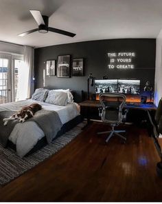 a bedroom with a bed, desk and chair next to a window that has the words'the future is yours to create'written on it