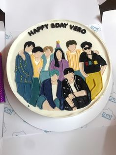 a birthday cake with an image of people on it