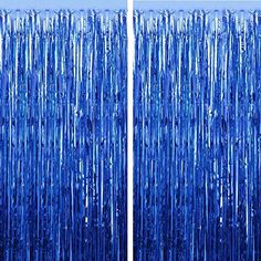 blue tinsel curtains are hanging on the wall